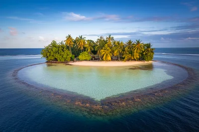 Aerial View Of A Heart Shaped Tropical Island