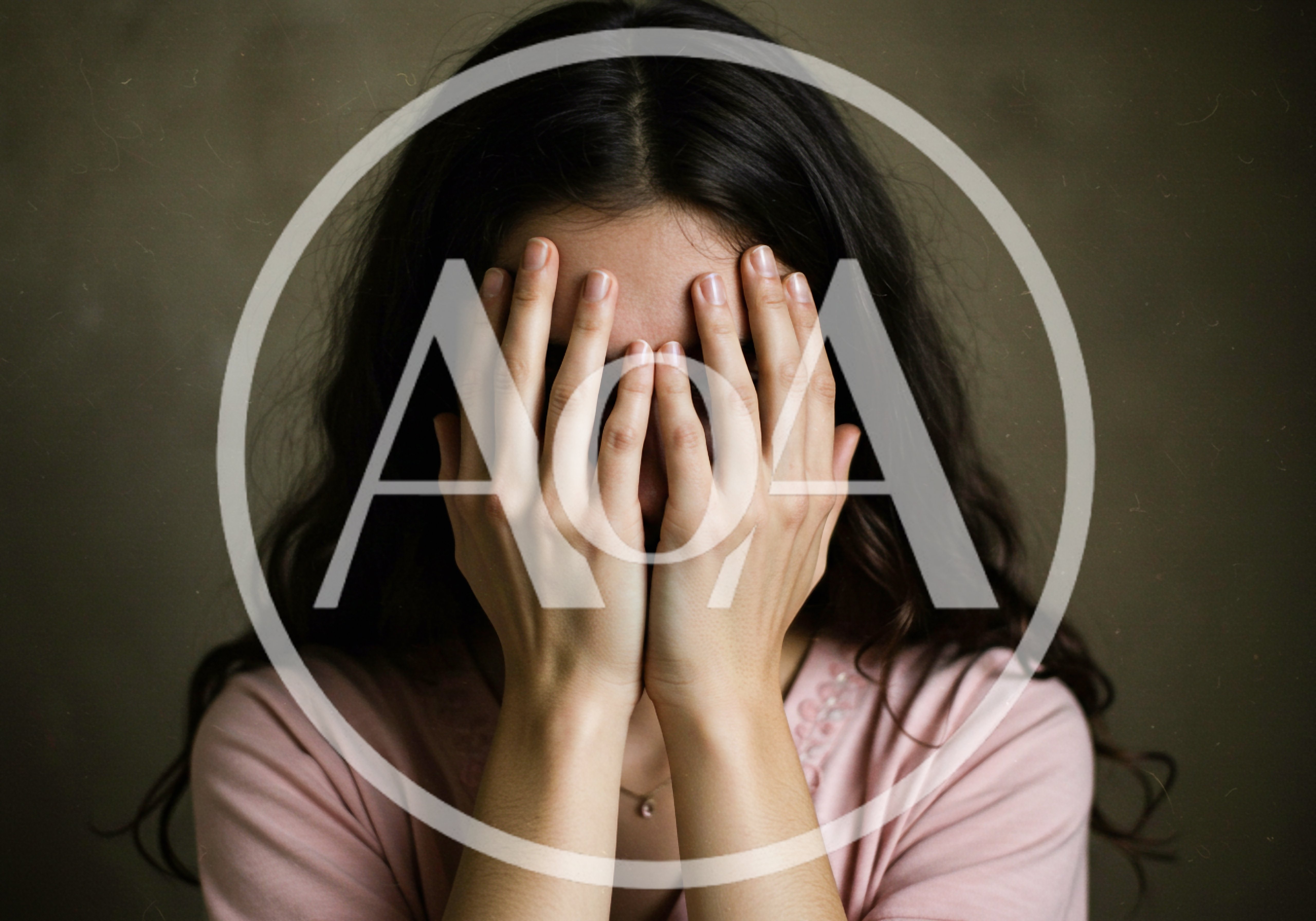 Young Woman Covering Her Face With Hands