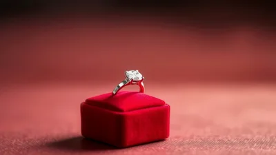 Diamond Engagement Ring On A Red Velvet Box