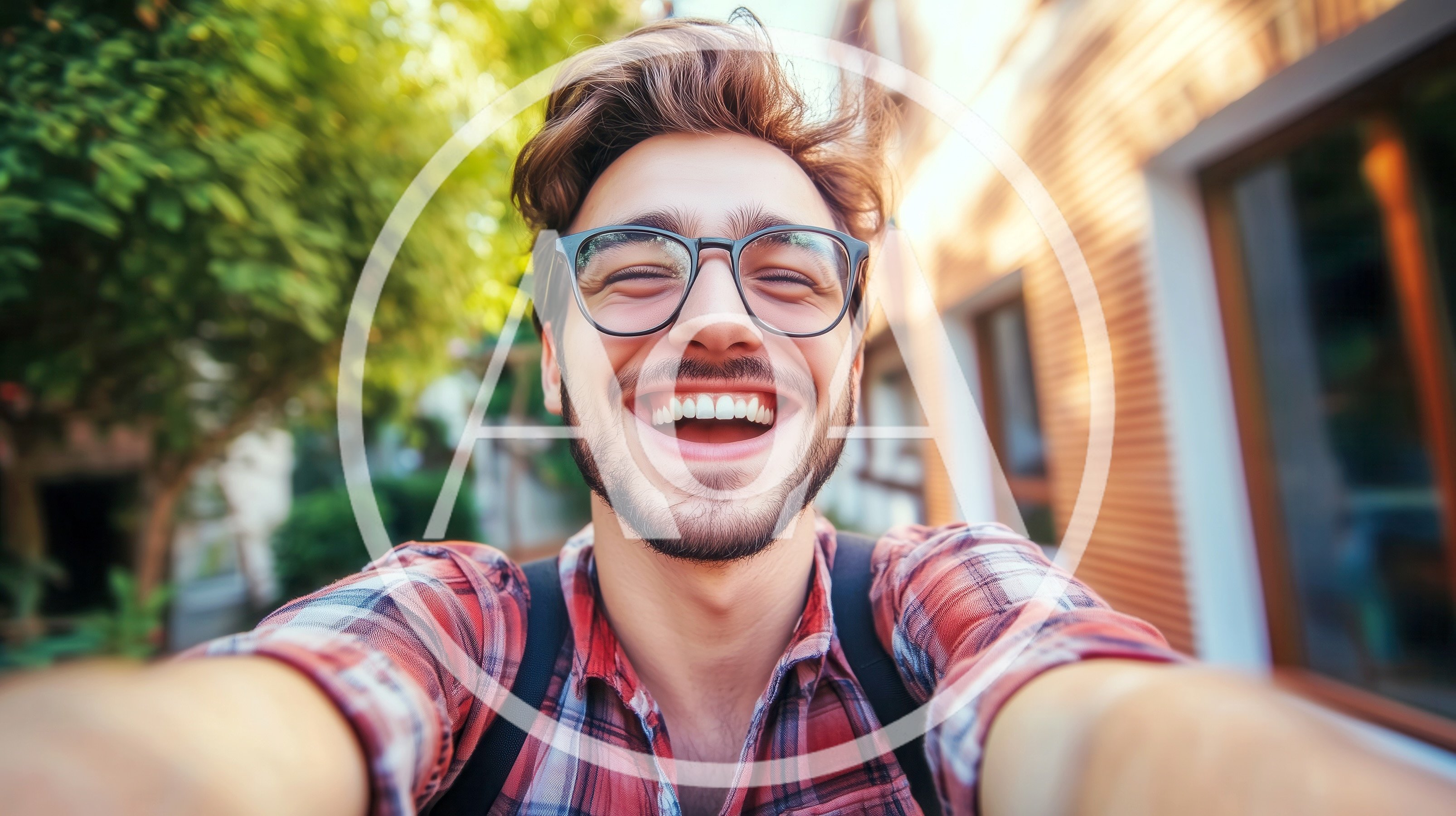Young Man Taking A Joyful Selfie Outdoors