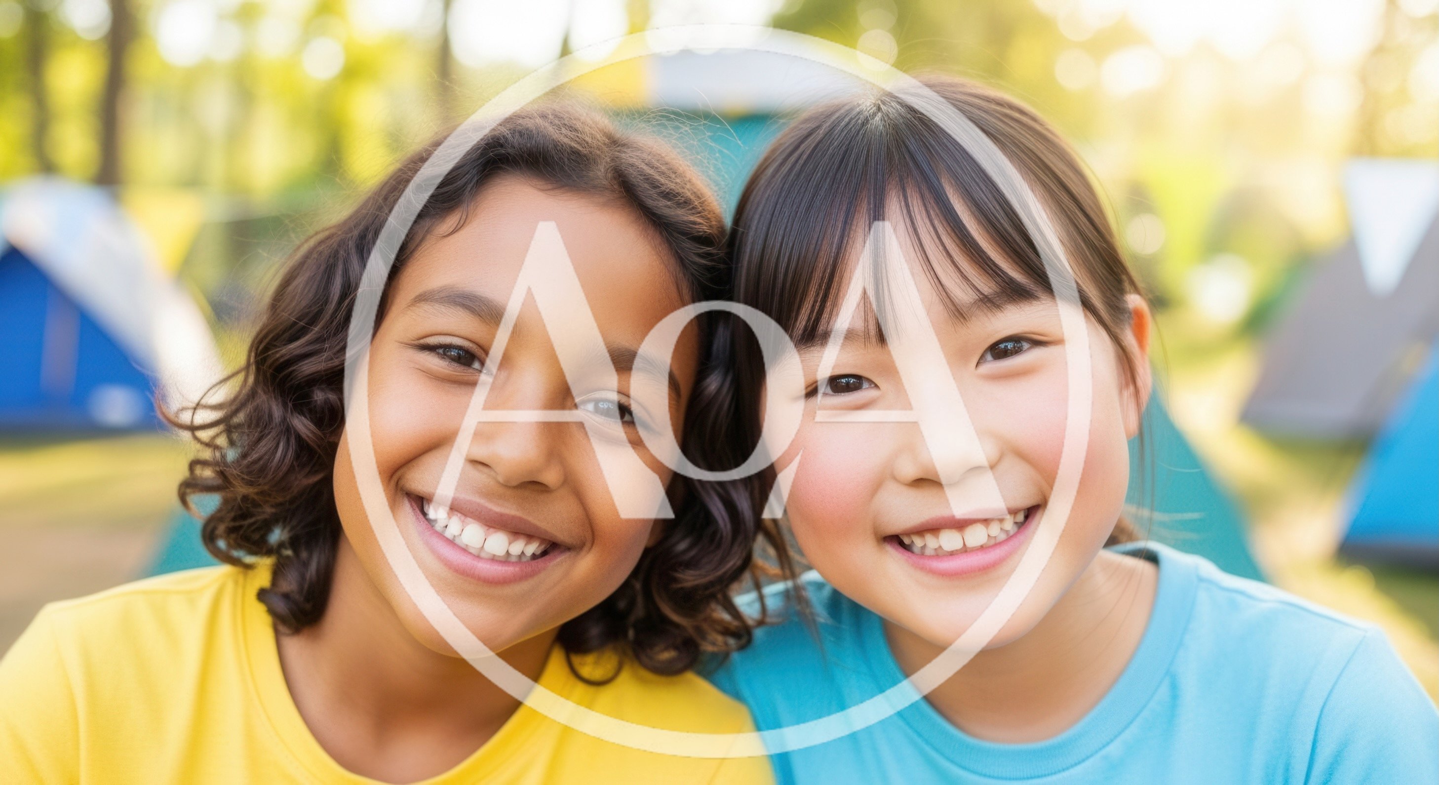 Two Diverse Young Girls Smiling Together at Summer Camp