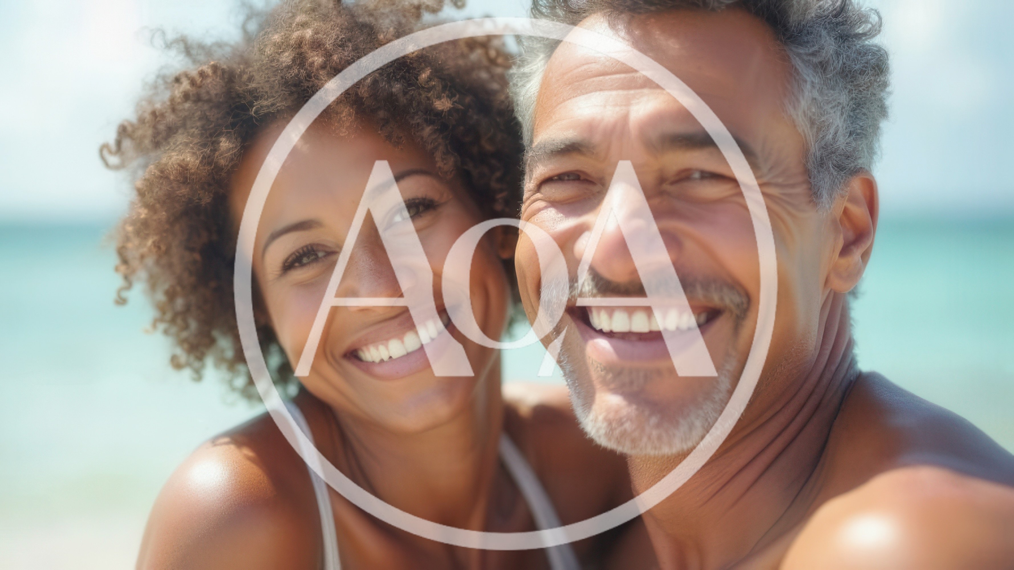 Happy Mature Couple Smiling Together On A Sunny Beach