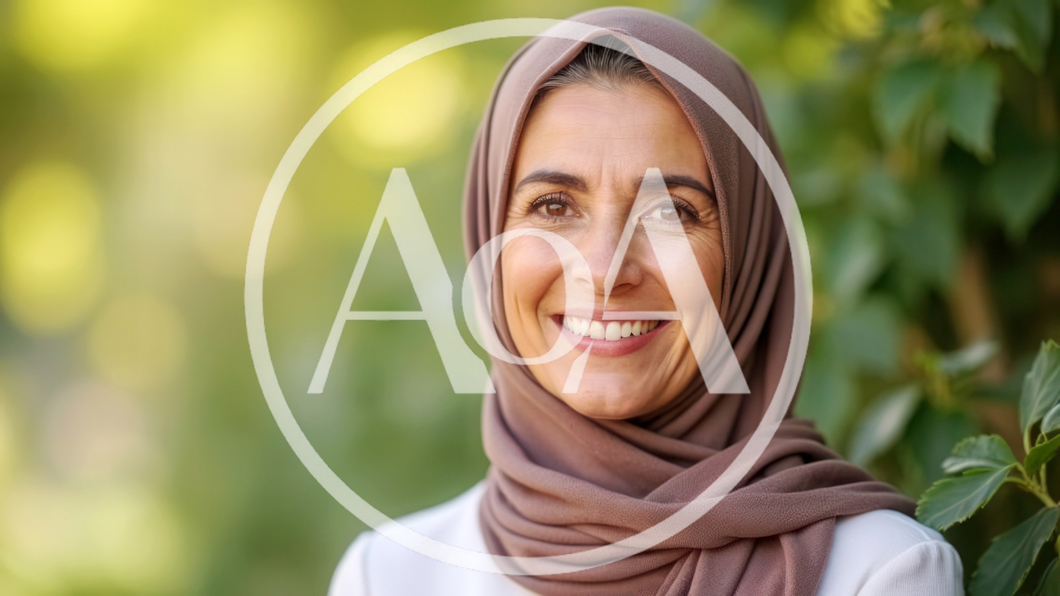 Portrait Of A Smiling Mature Woman Wearing A Hijab
