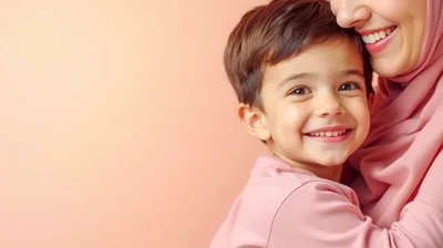 Happy Young Boy Hugging His Mother