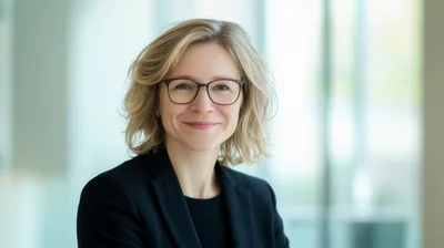 Professional Businesswoman With Blonde Hair Wearing Glasses