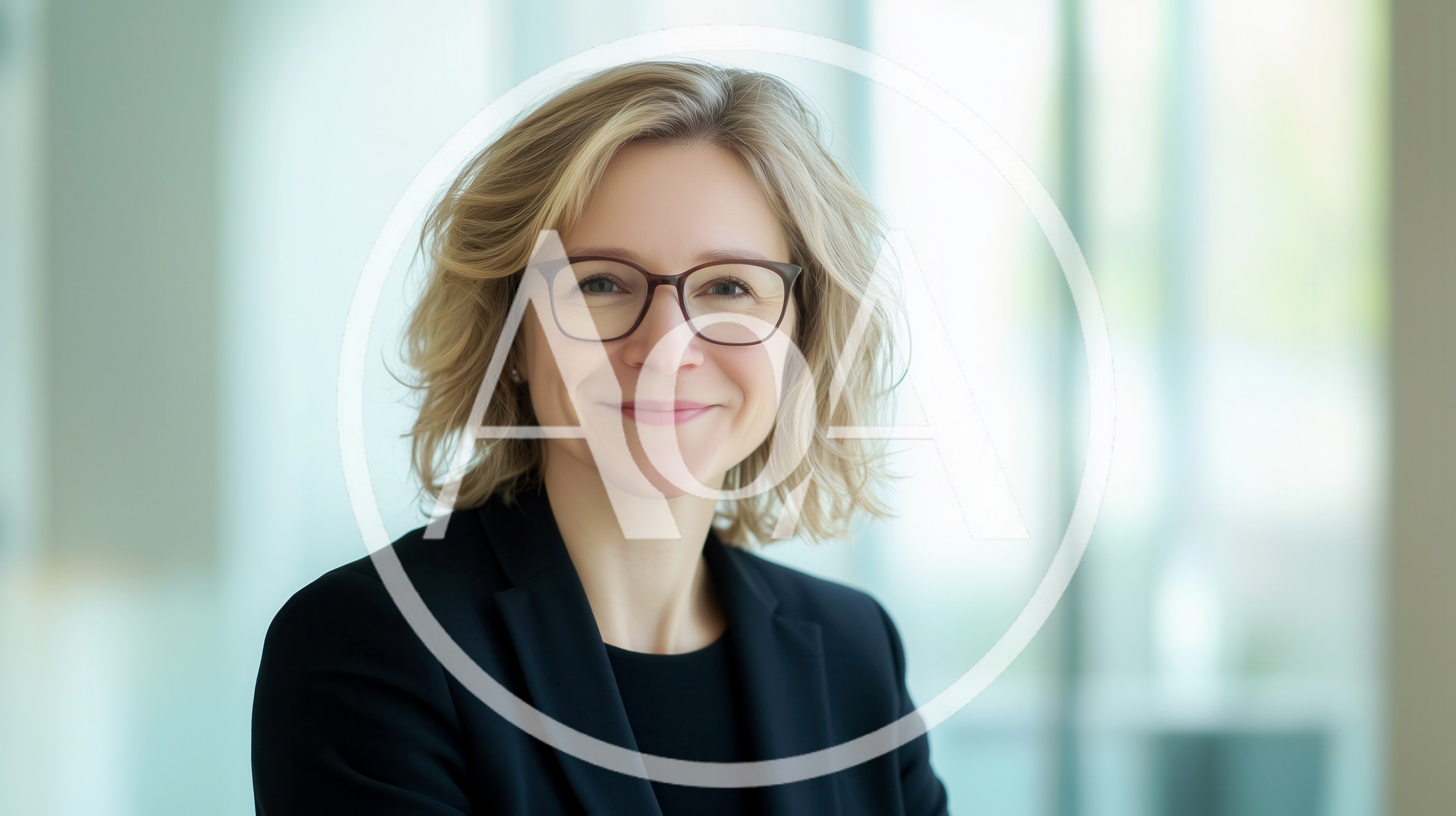 Professional Businesswoman With Blonde Hair Wearing Glasses