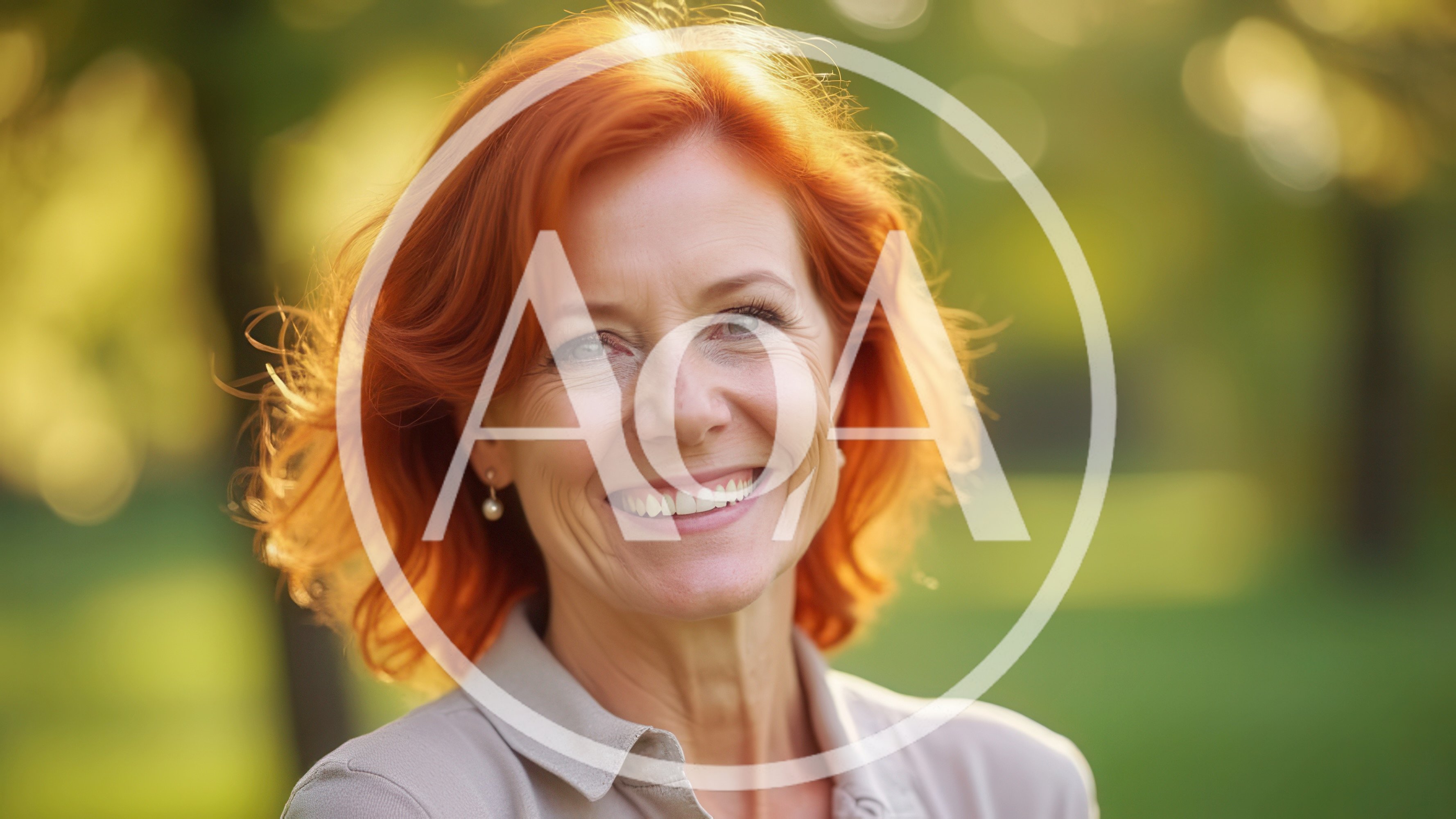 Portrait Of A Smiling Mature Woman With Red Hair