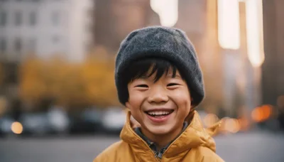 Happy Young Asian Boy Smiling Outdoors