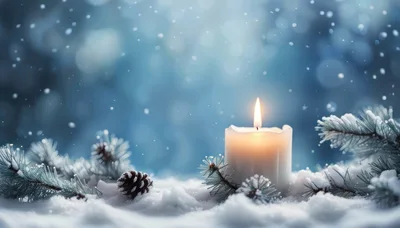 Lit Christmas Candle With Pine Branches In Snow