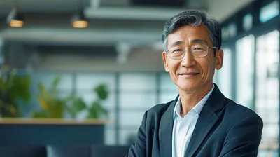 Portrait Of A Professional Asian Businessman In Office