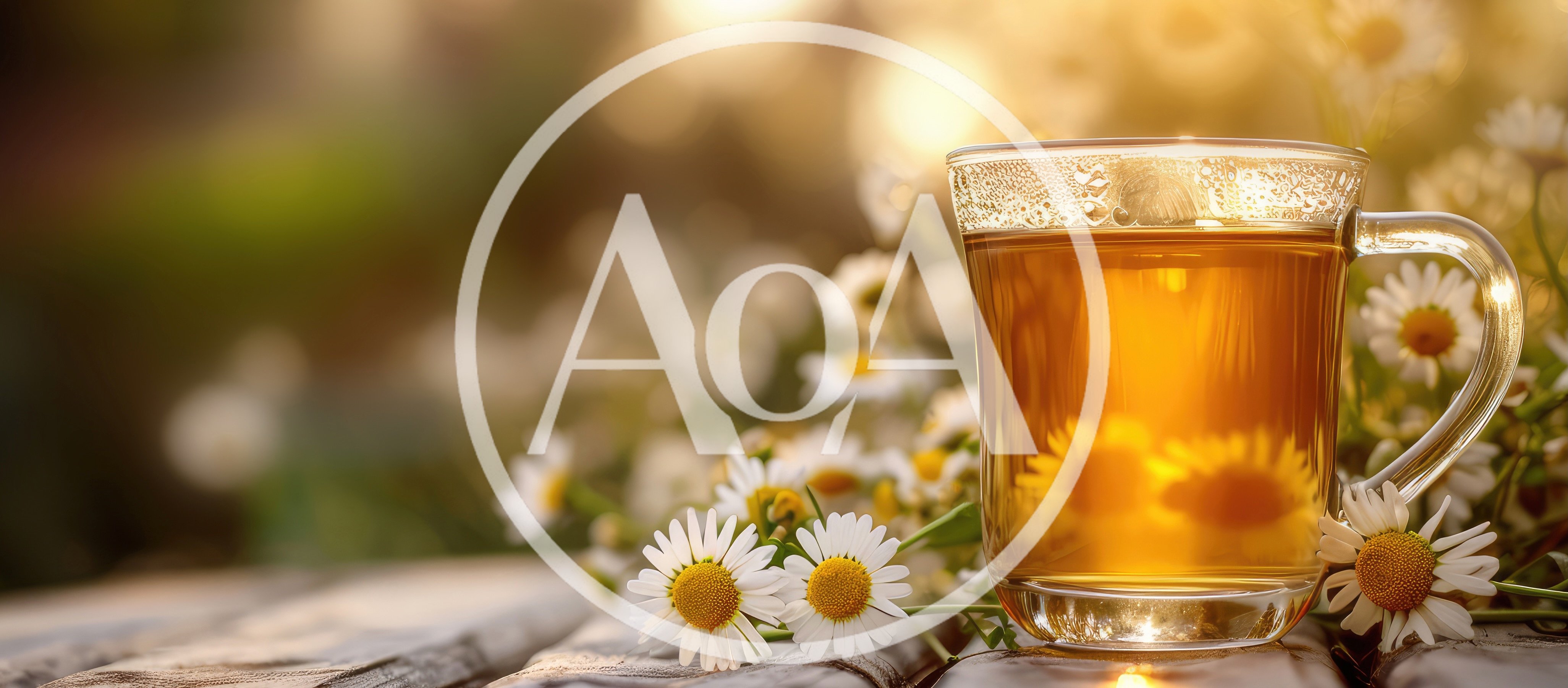 Glass Mug Of Chamomile Tea With Fresh Flowers