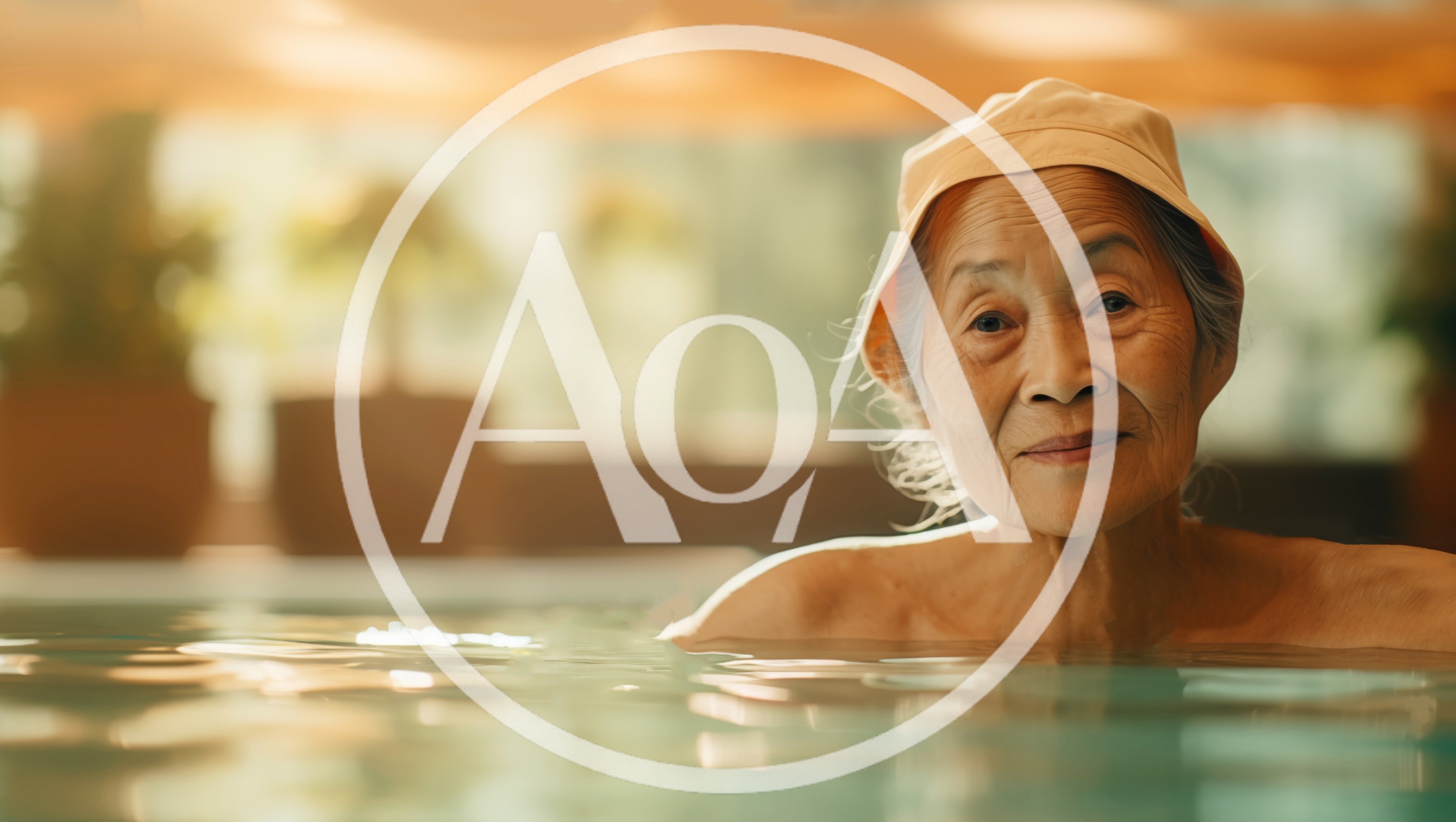 Senior Asian Woman Relaxing In A Warm Indoor Pool