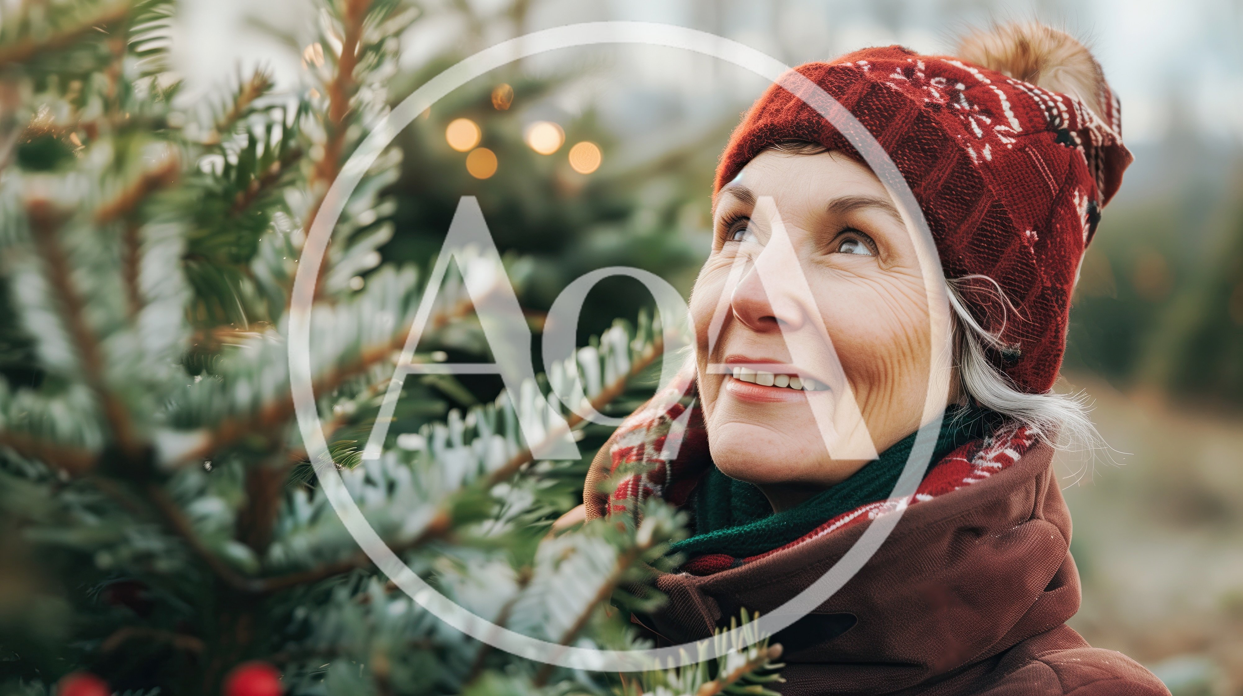 Mature Woman Choosing A Christmas Tree Outdoors
