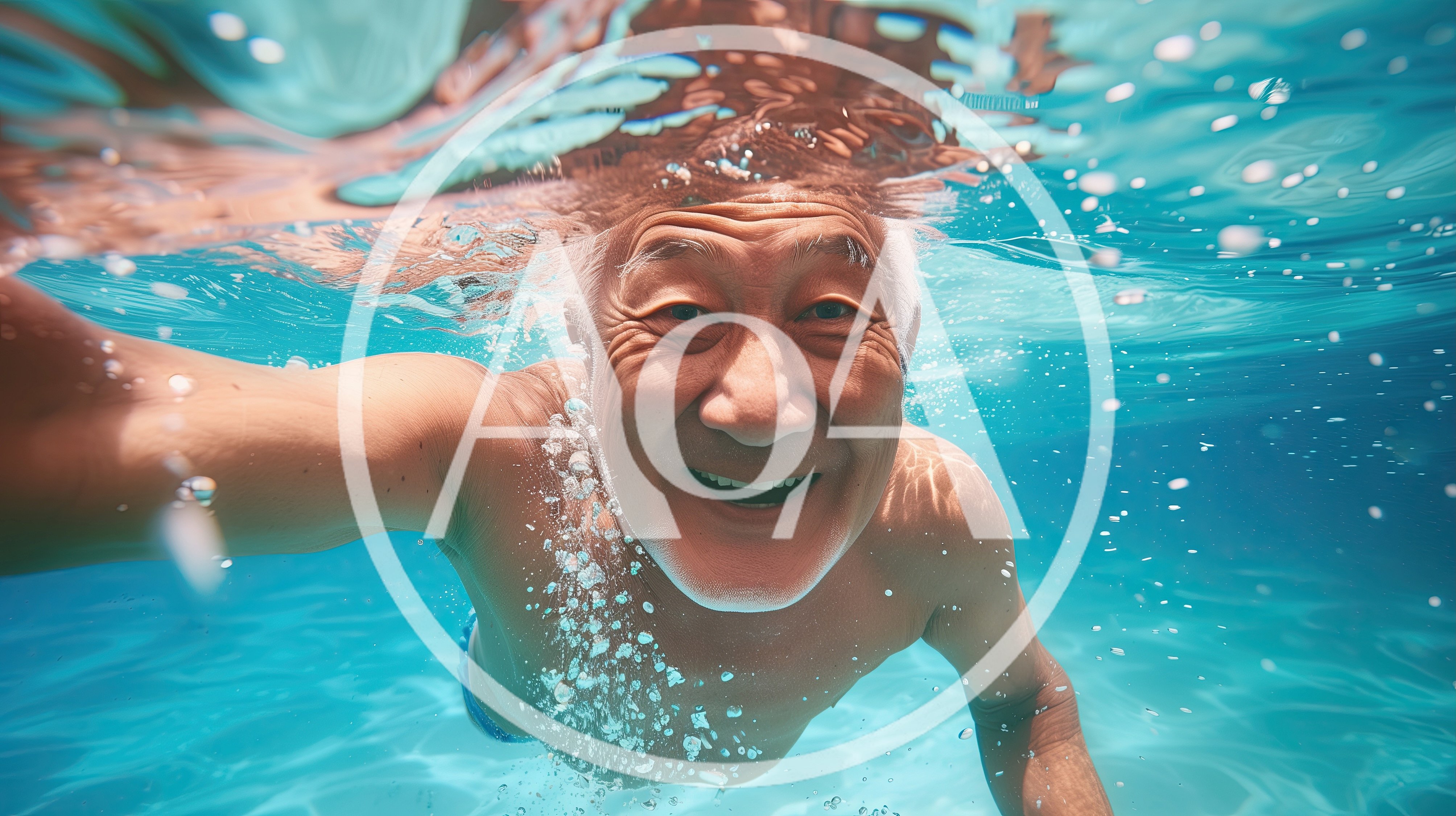 Senior Asian Man Taking Underwater Selfie in Swimming Pool