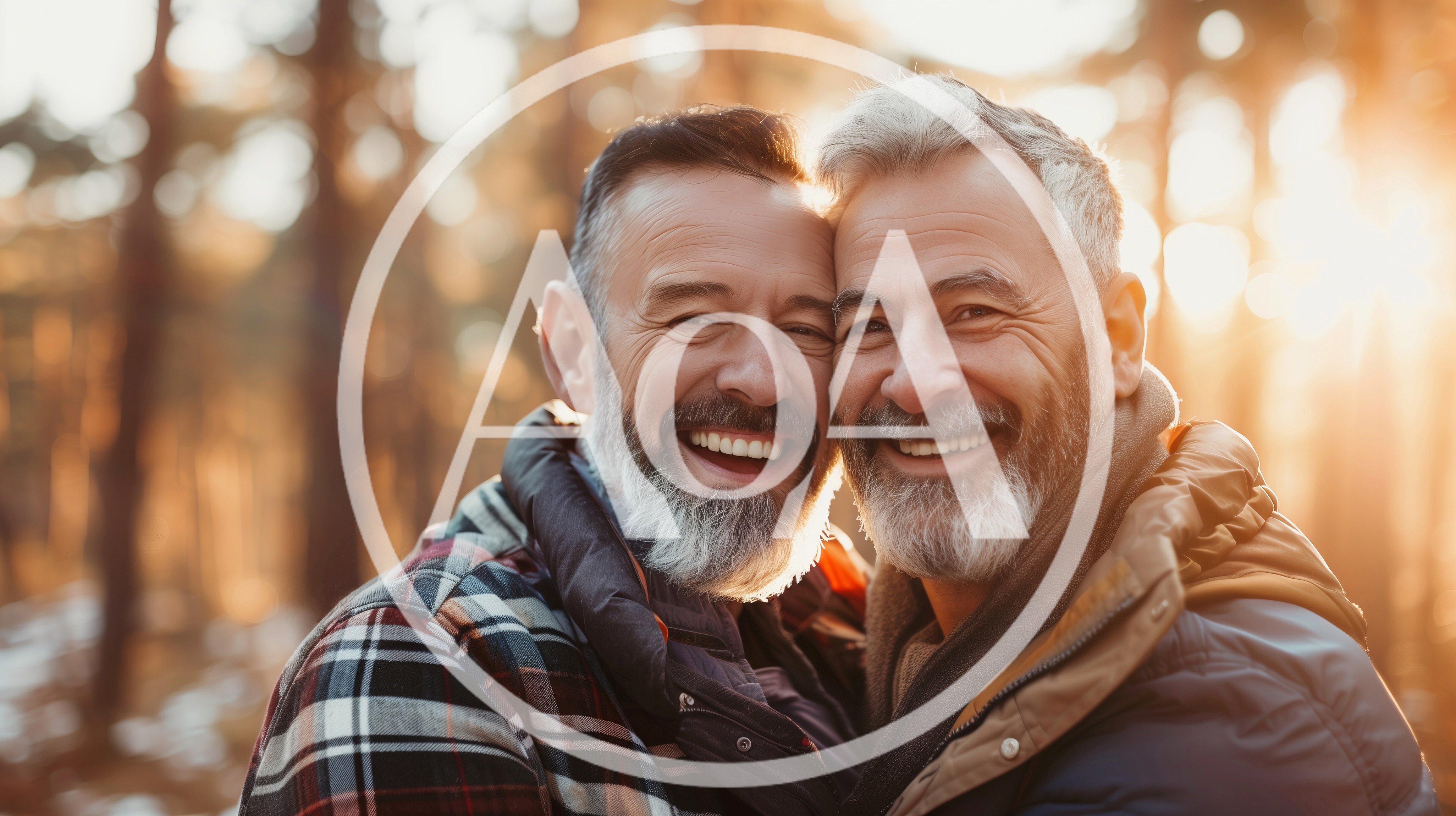 Two Mature Men Embracing Outdoors During Golden Hour