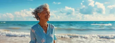 Happy Elderly Woman Smiling On A Sunny Beach