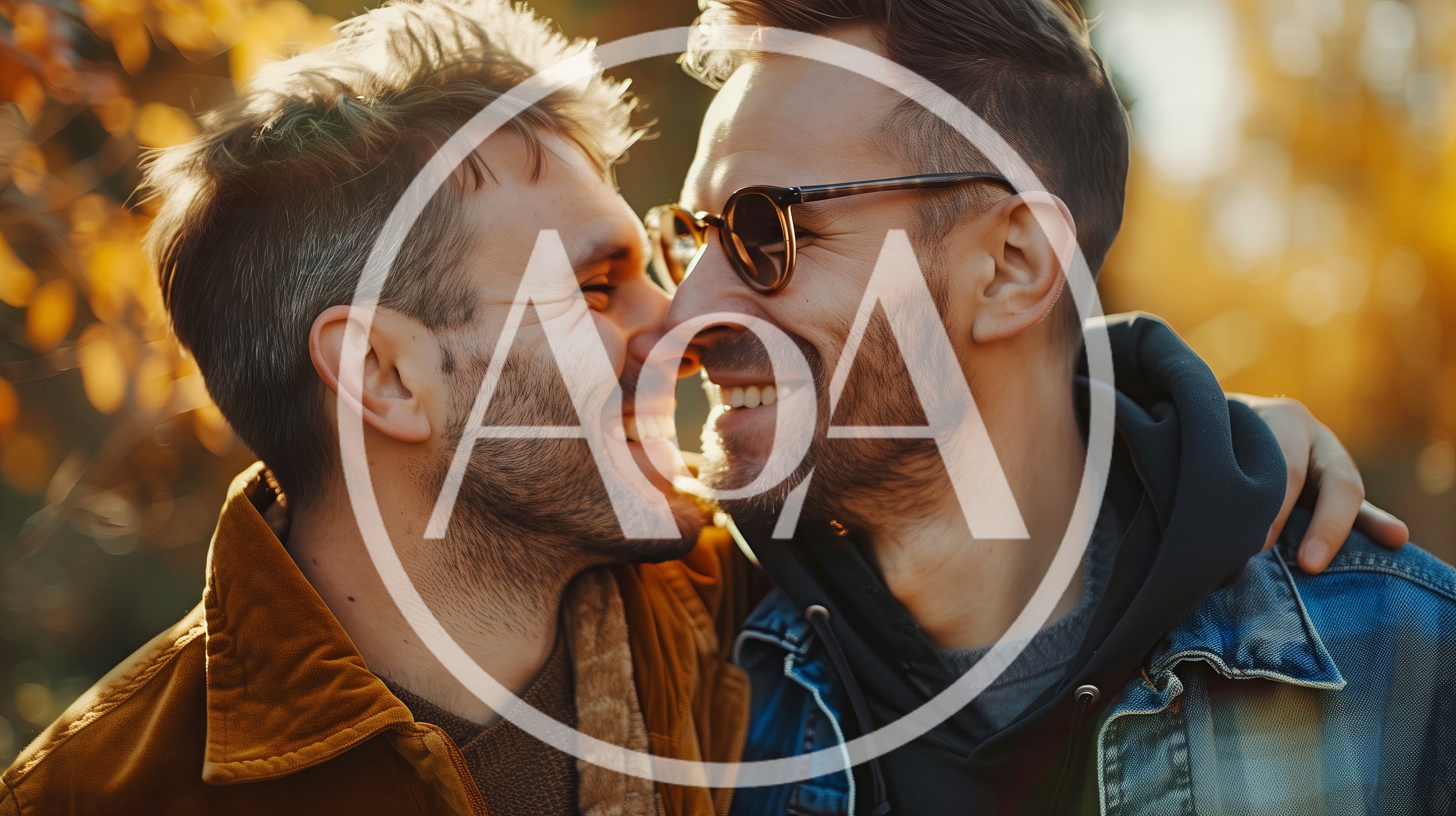 Two Men Embracing Outdoors During Golden Hour
