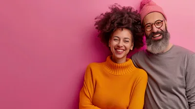 Happy Diverse Couple Posing Against Pink Background