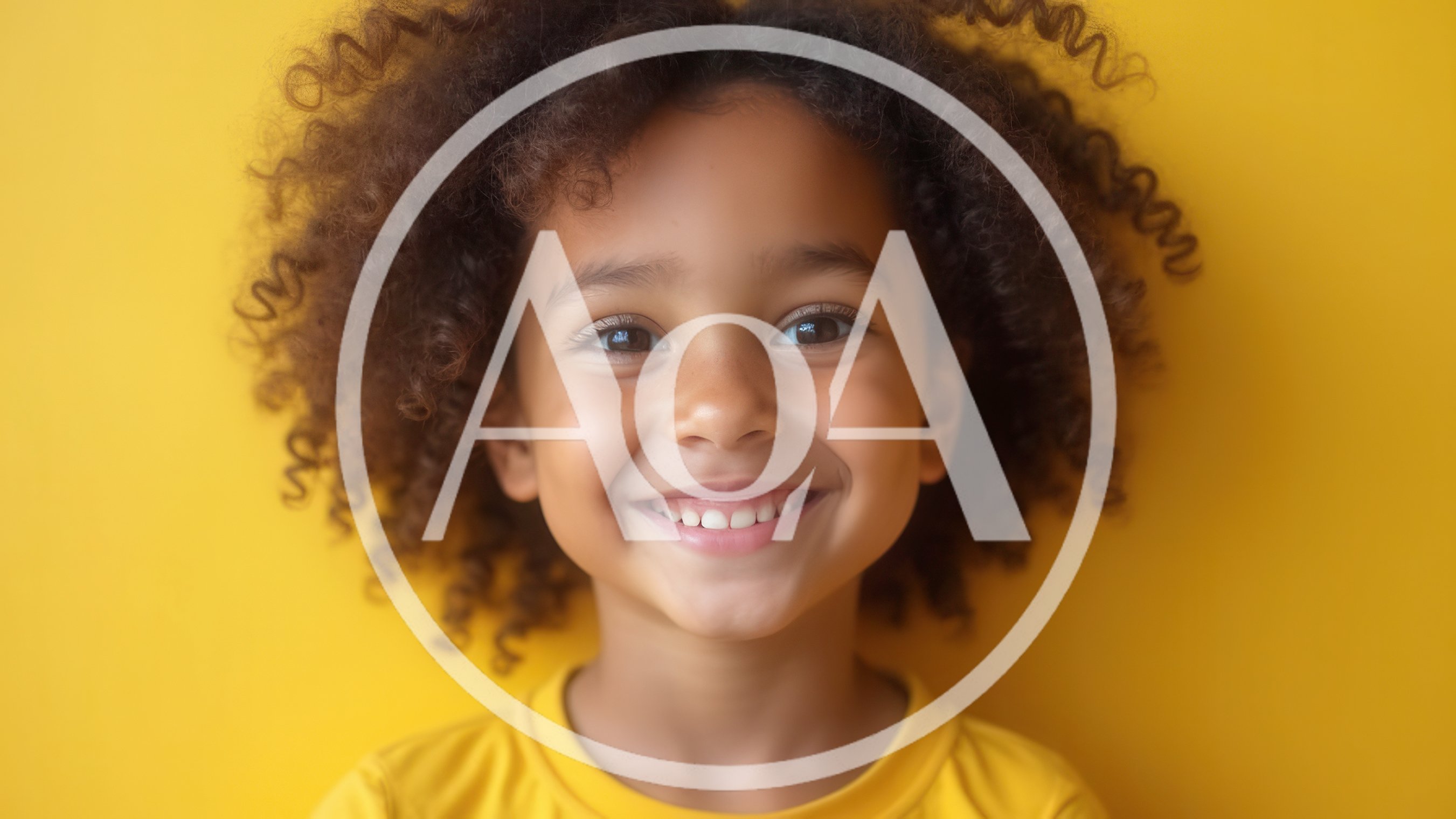 Portrait Of A Smiling Young Girl With Curly Hair