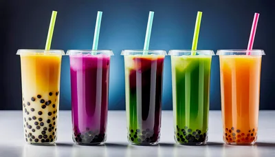 Five Colorful Bubble Tea Drinks In Plastic Cups