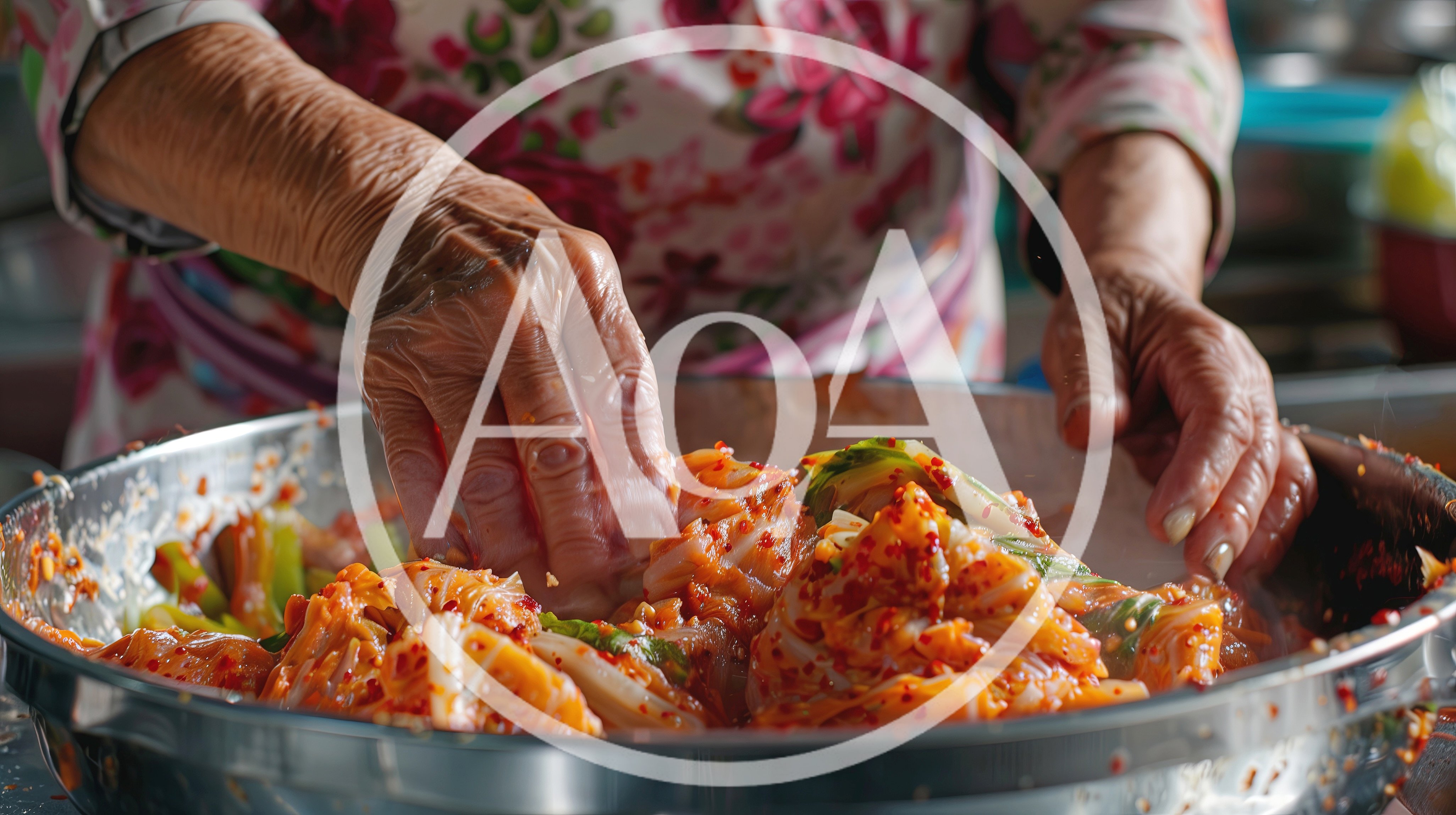 Elderly Woman Preparing Traditional Kimchi In A Metal Bowl