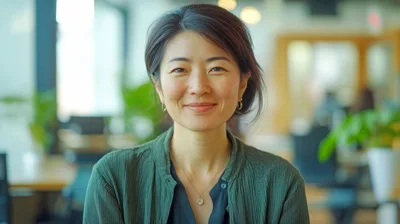 Portrait Of A Smiling Asian Woman In An Office
