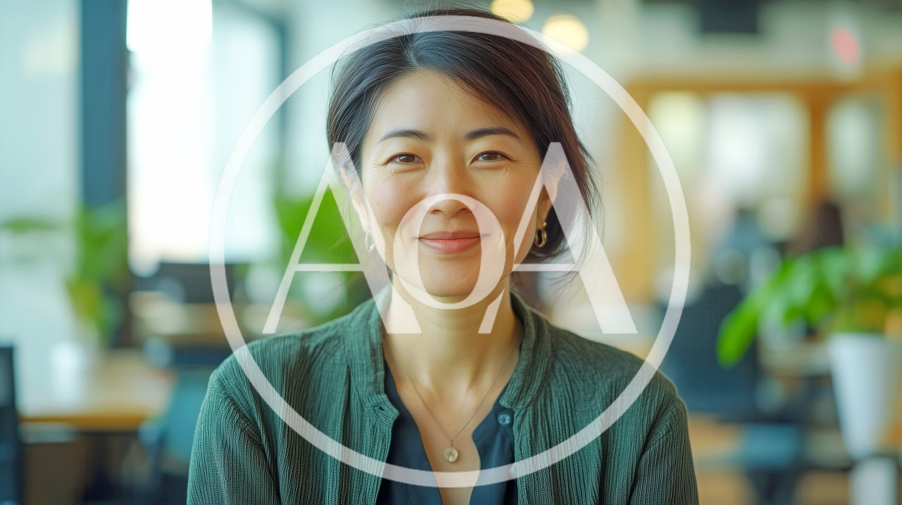 Portrait Of A Smiling Asian Woman In An Office