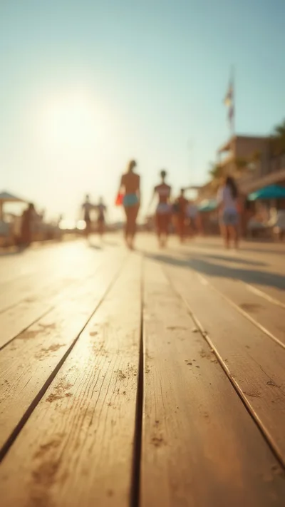 People Walking On A Wooden Boardwalk At Sunset