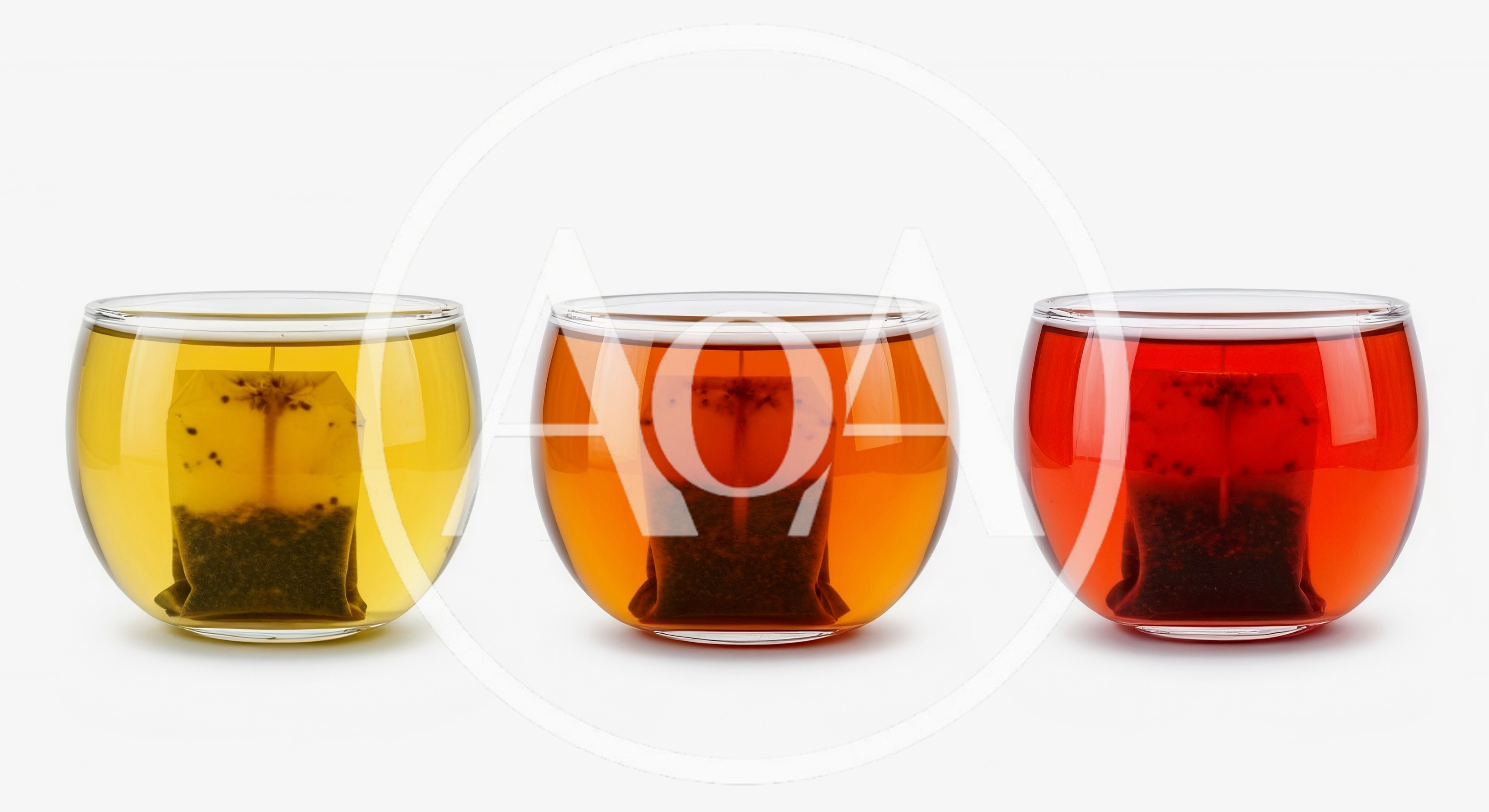 Three Glass Cups With Different Tea Infusions