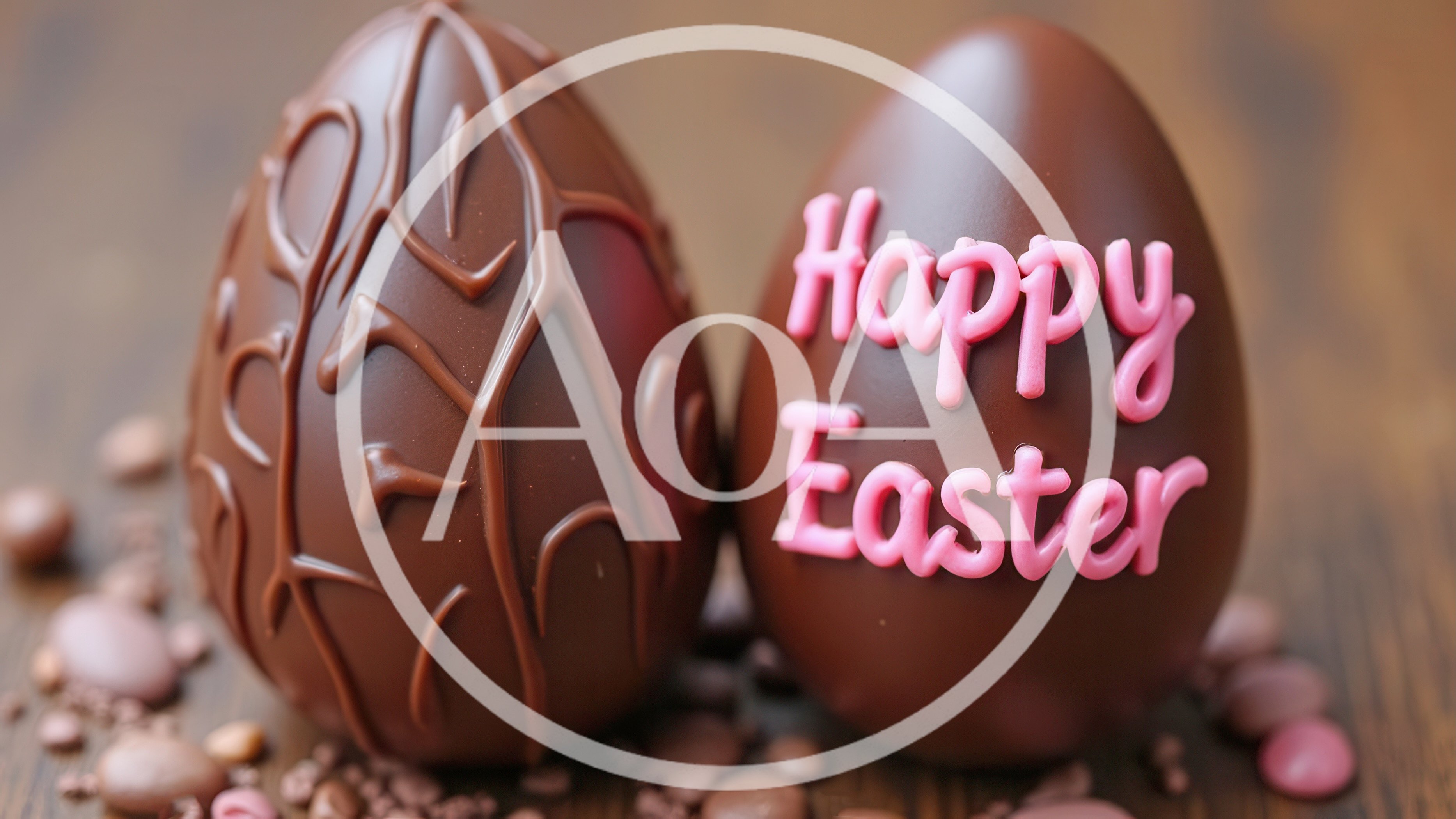Two Chocolate Easter Eggs On A Wooden Surface