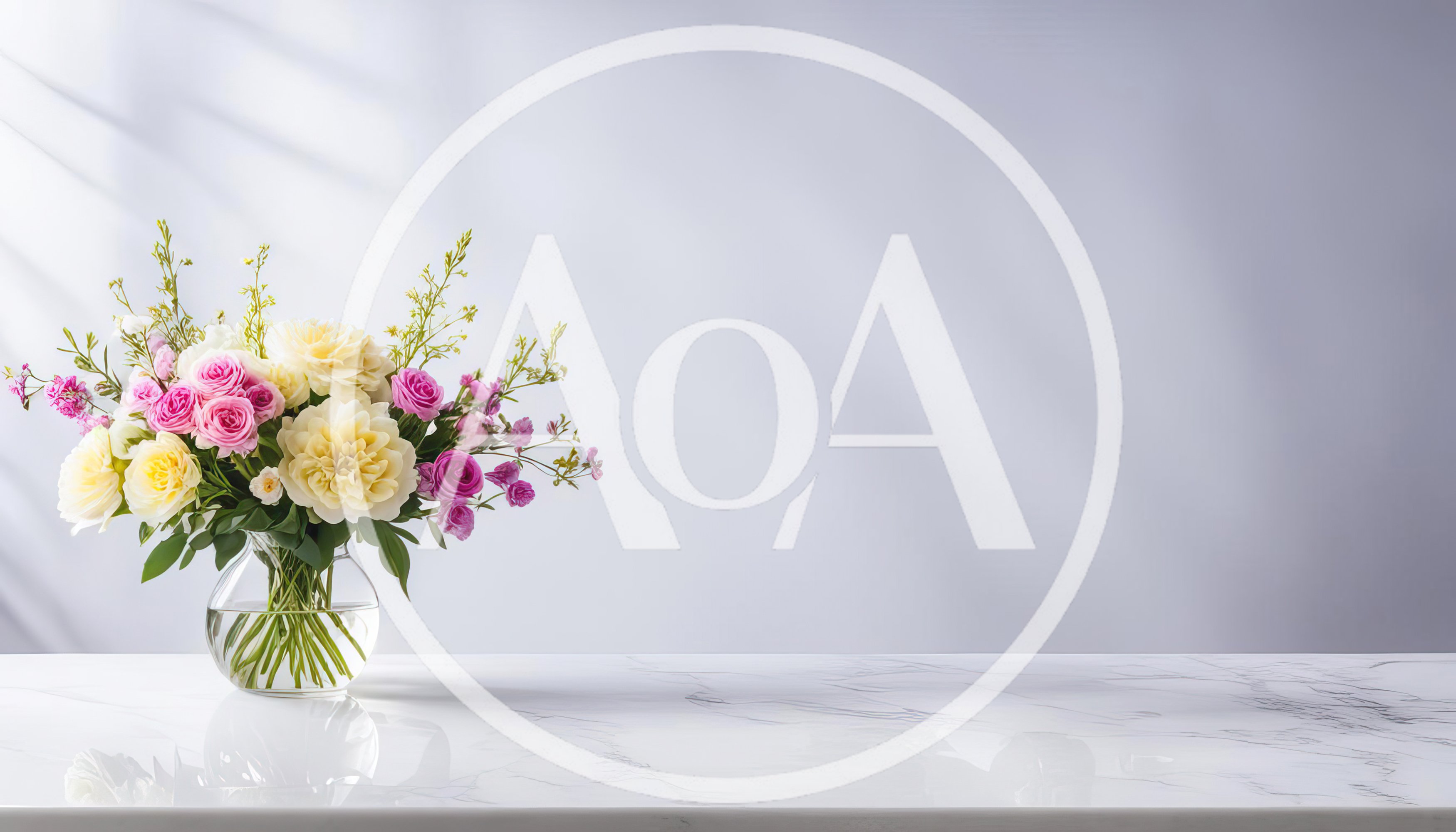 Floral Arrangement in Glass Vase on Marble Table