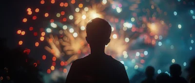 Silhouette Of A Person Watching Fireworks Display