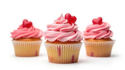 Three Pink Frosted Cupcakes With Heart Toppers