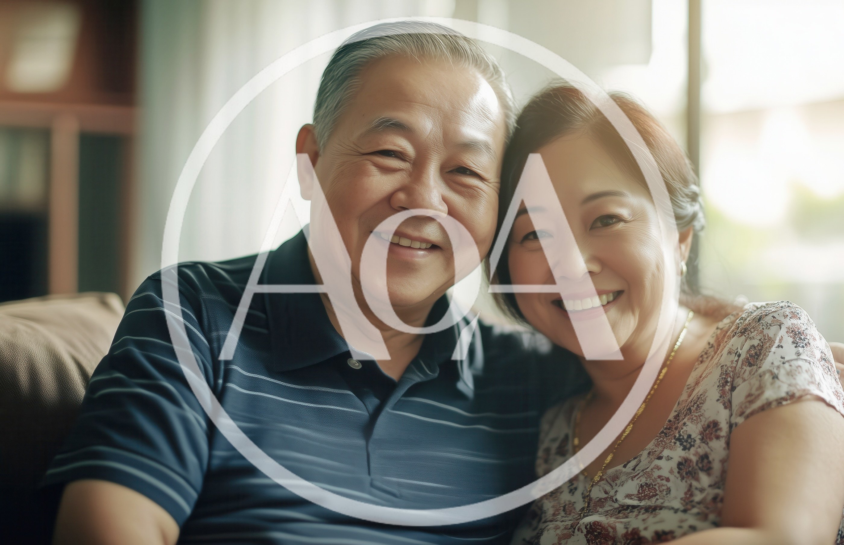 Happy Senior Asian Couple Embracing At Home