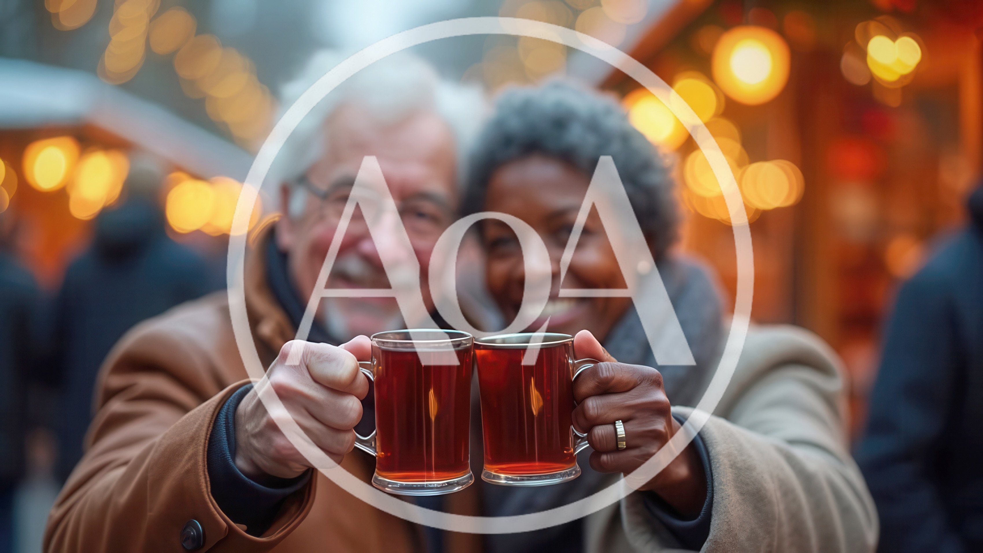 Senior Couple Toasting With Mulled Wine At Christmas Market