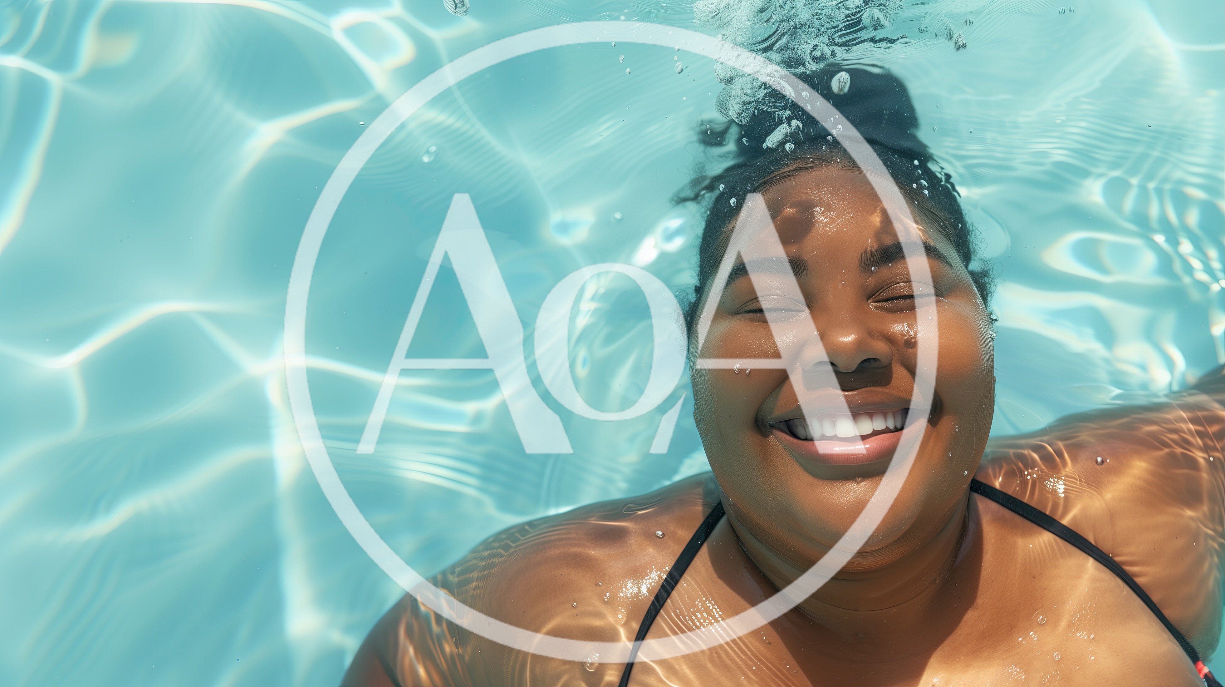 Happy Woman Floating In A Swimming Pool