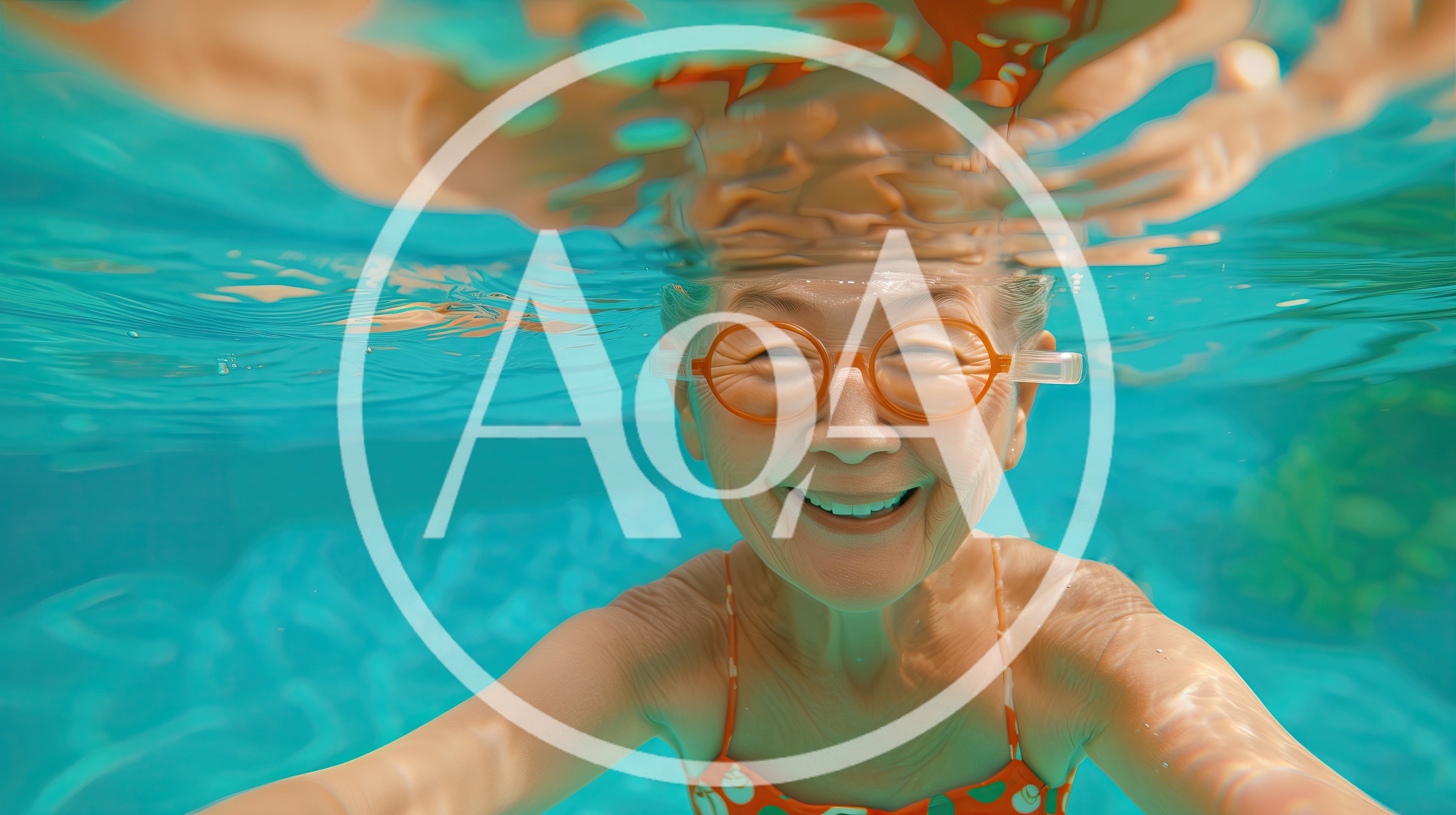 Senior Woman Swimming Underwater With Orange Goggles