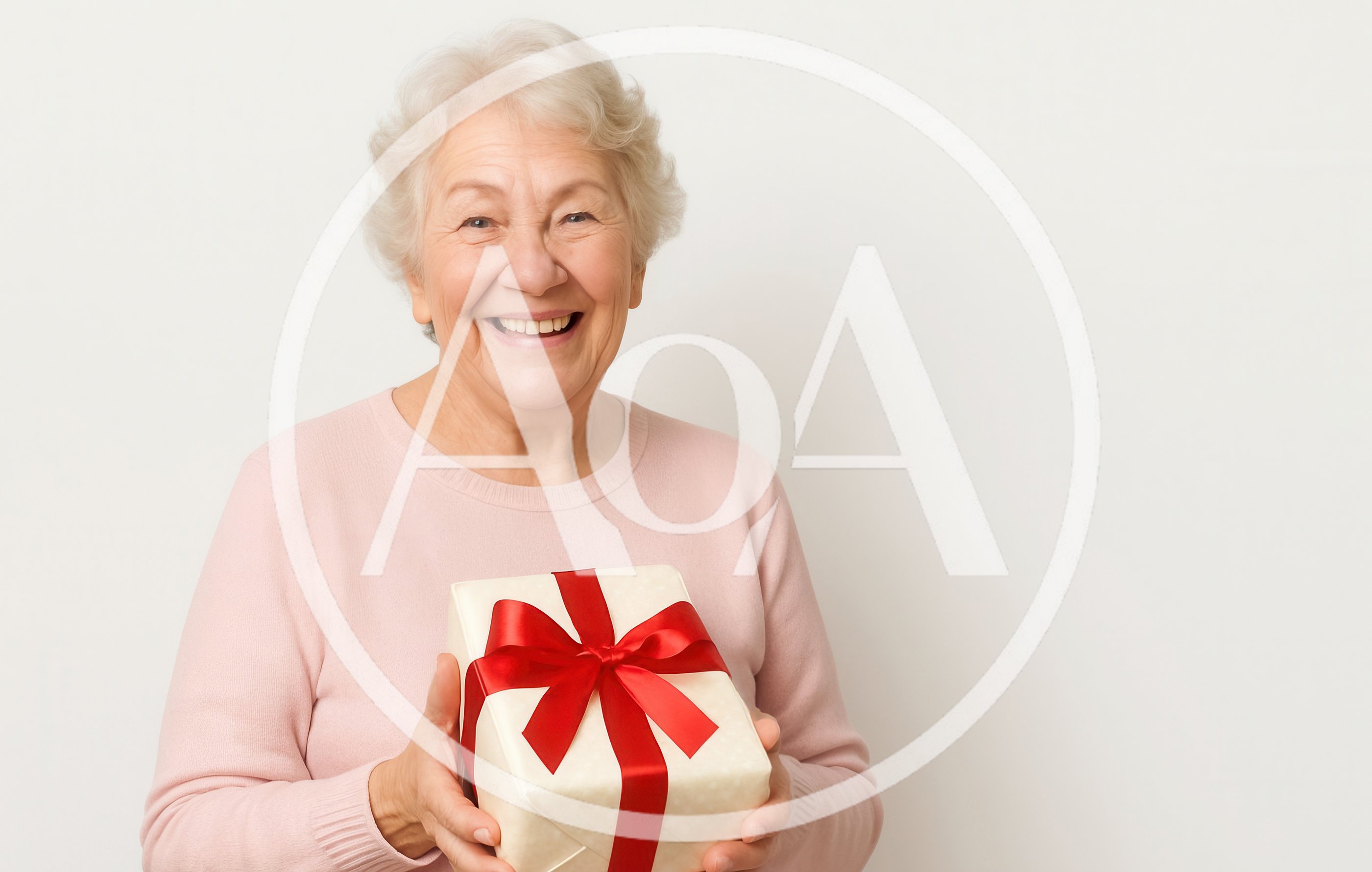 Happy Senior Woman Holding A Gift Box