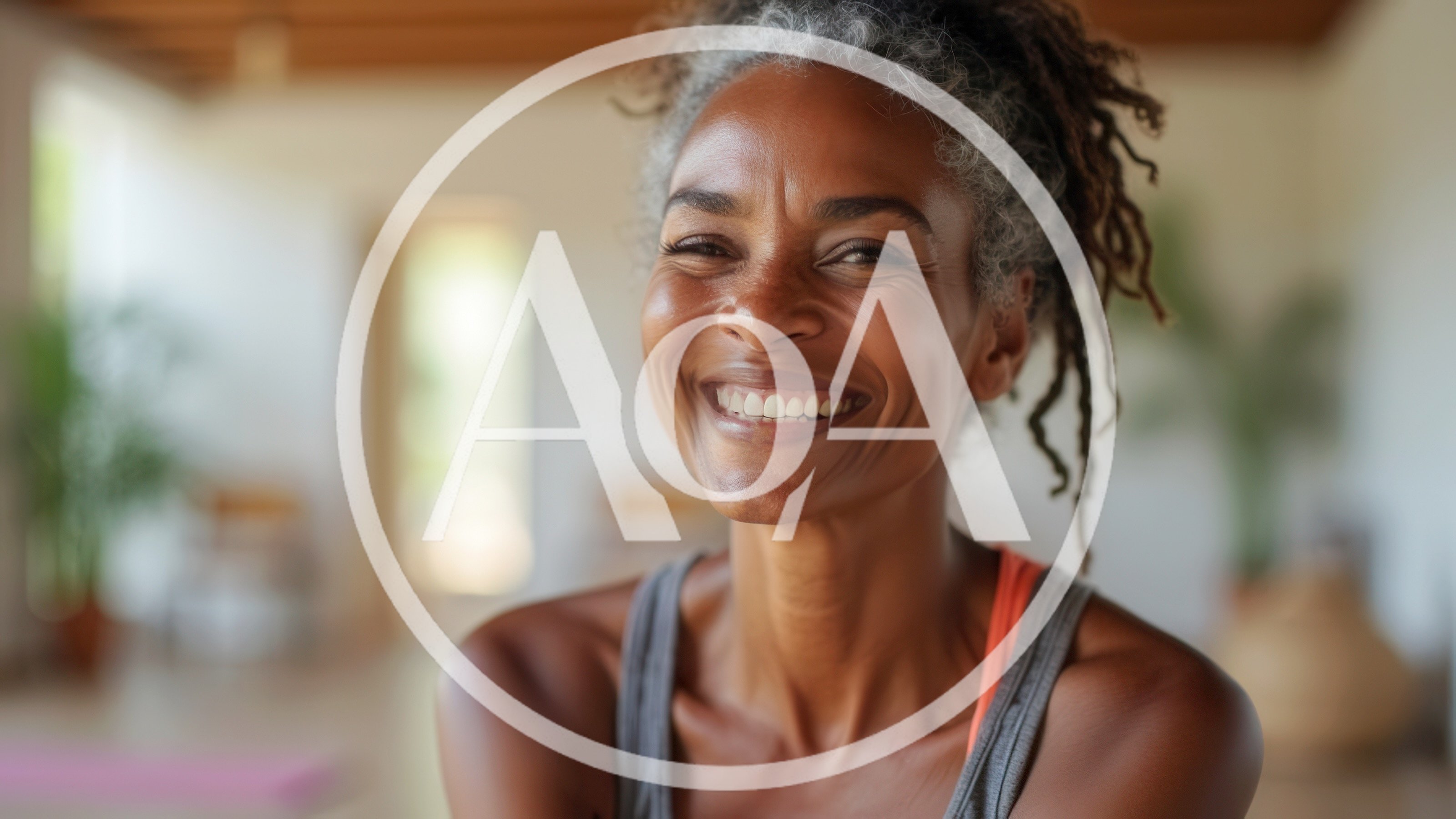 Smiling Mature Woman With Gray Locs In Yoga Studio