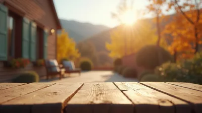 Rustic Wooden Table Surface With Blurred Autumn Patio Background