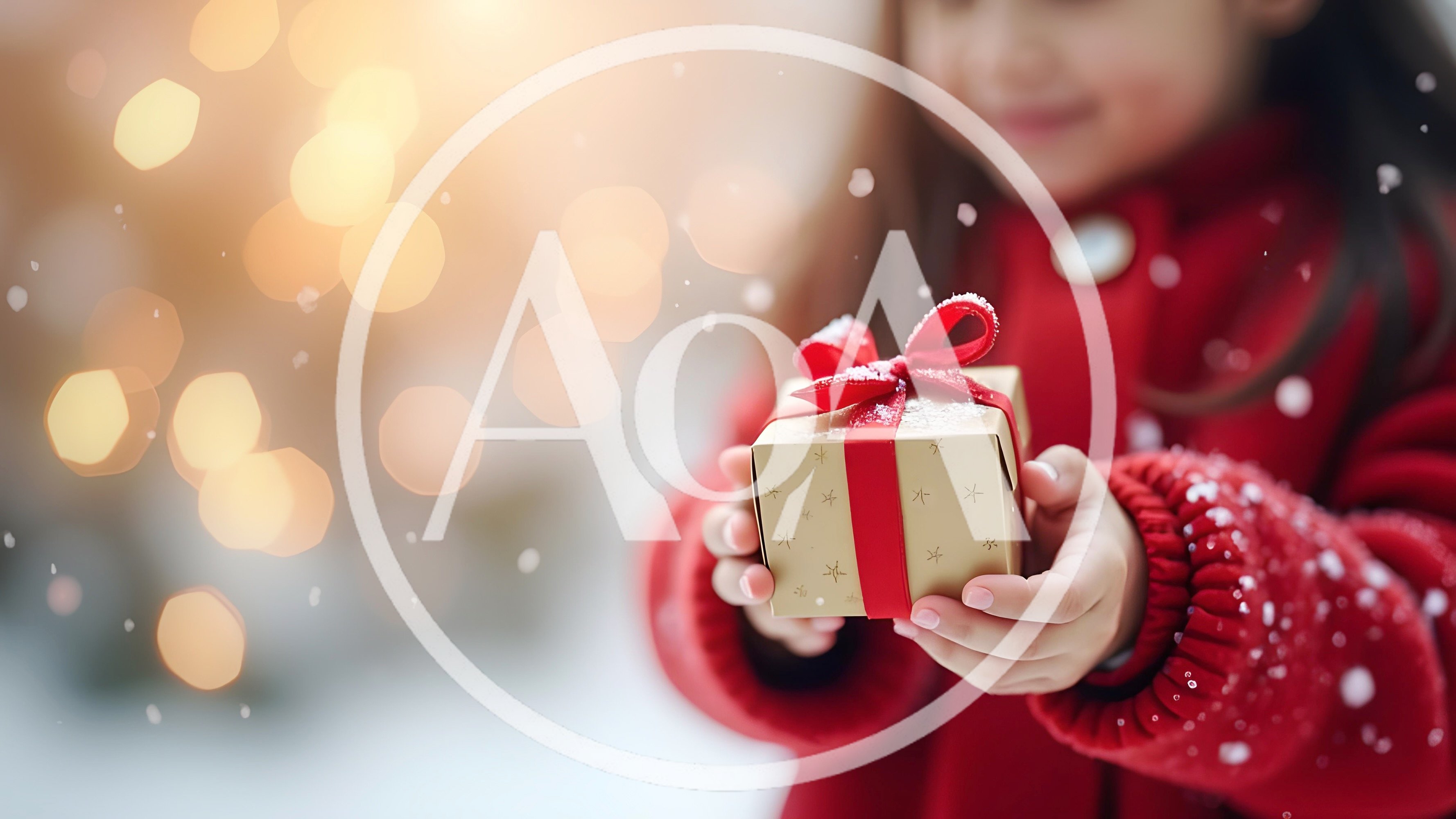 Young Girl Holding A Christmas Gift In The Snow