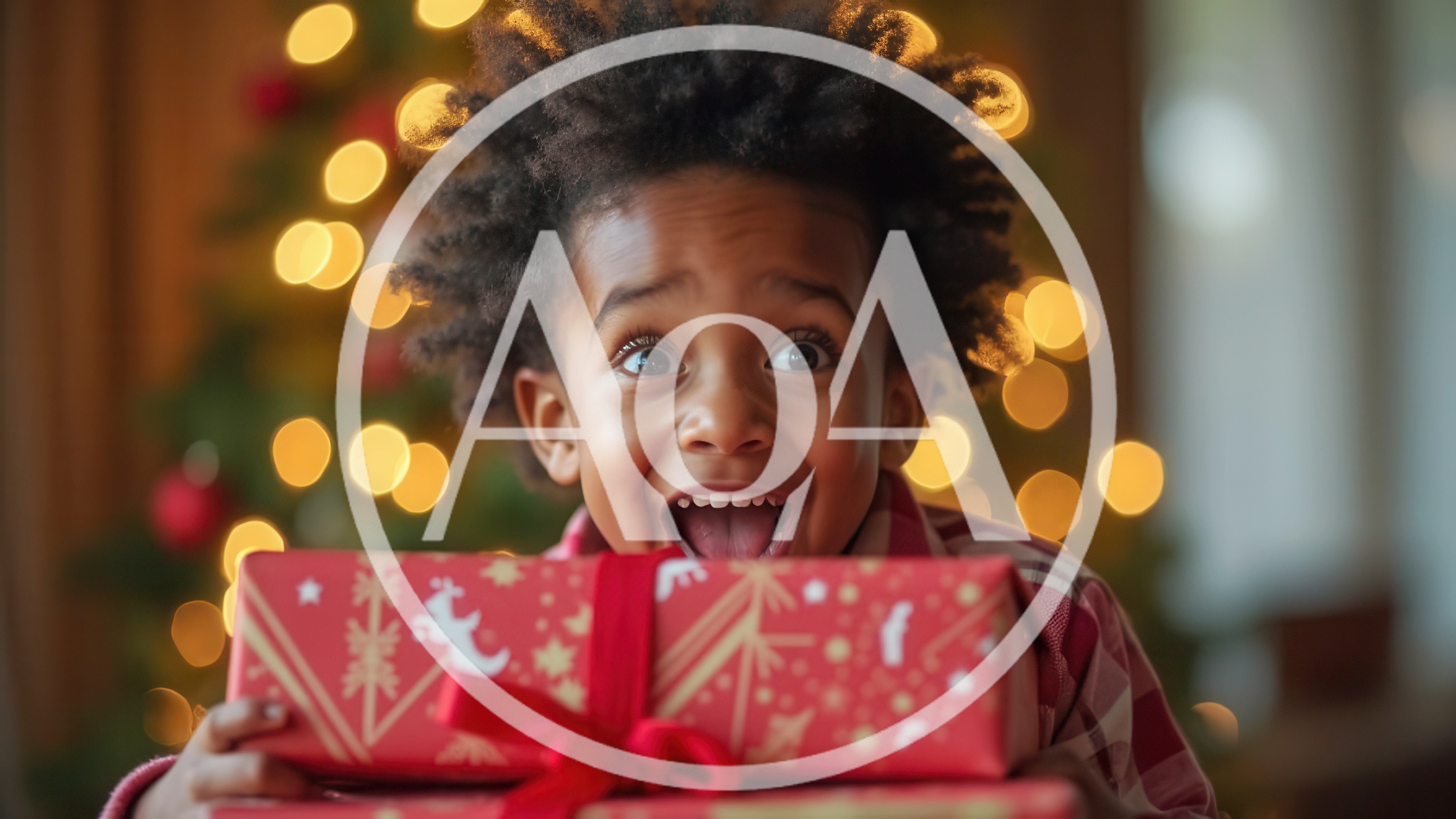 Excited Young Boy Holding Christmas Gift
