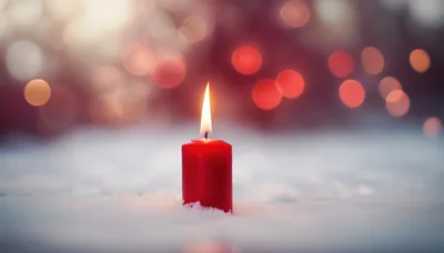 Red Christmas Candle Burning In The Snow