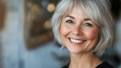 Portrait Of A Smiling Mature Woman With Silver Hair
