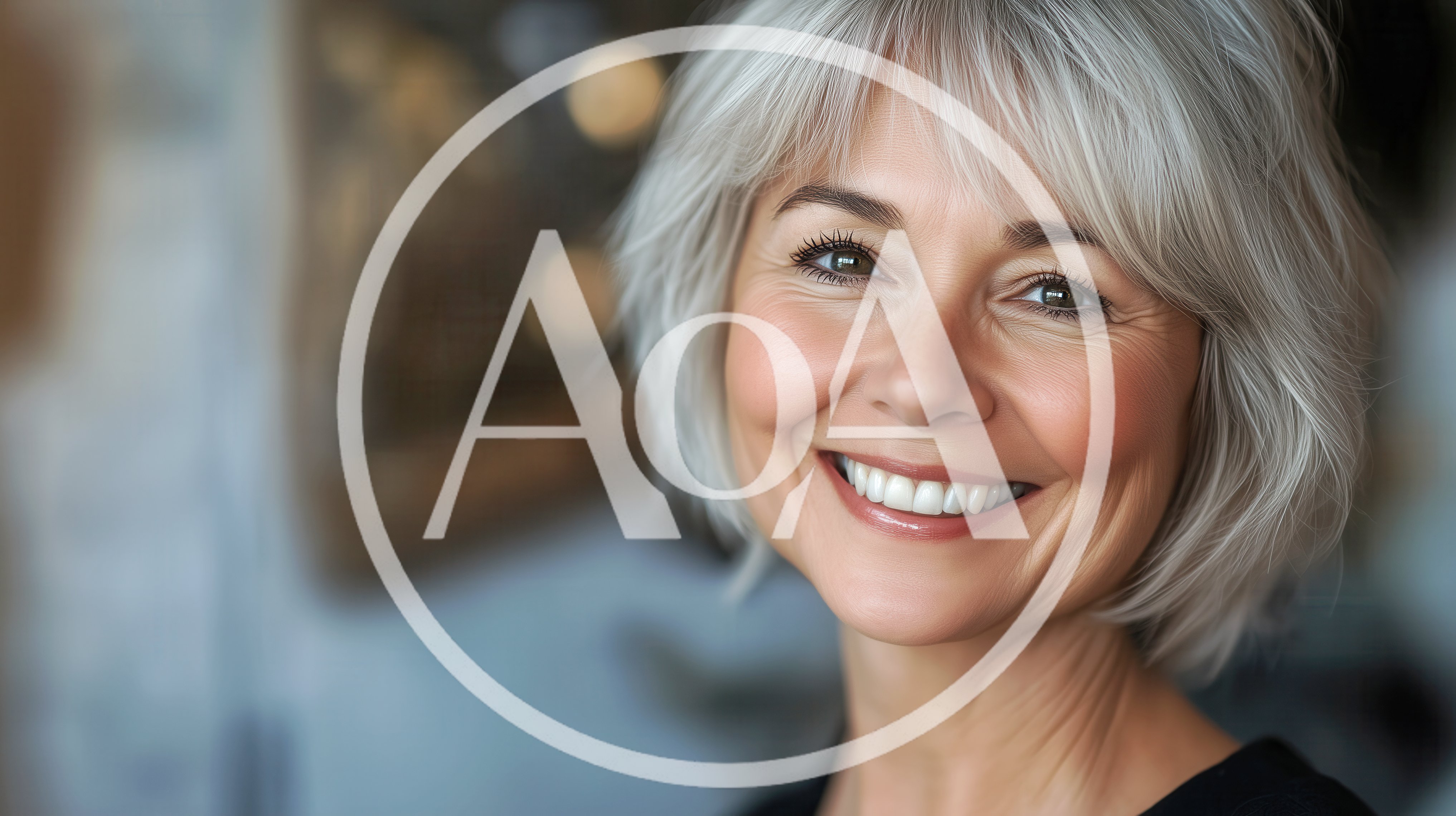 Portrait Of A Smiling Mature Woman With Silver Hair