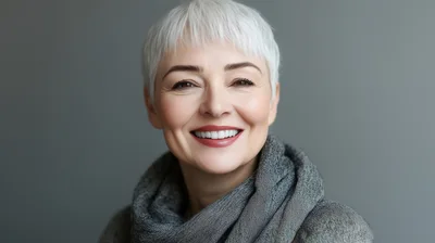 Portrait Of A Smiling Mature Woman With Short Hair