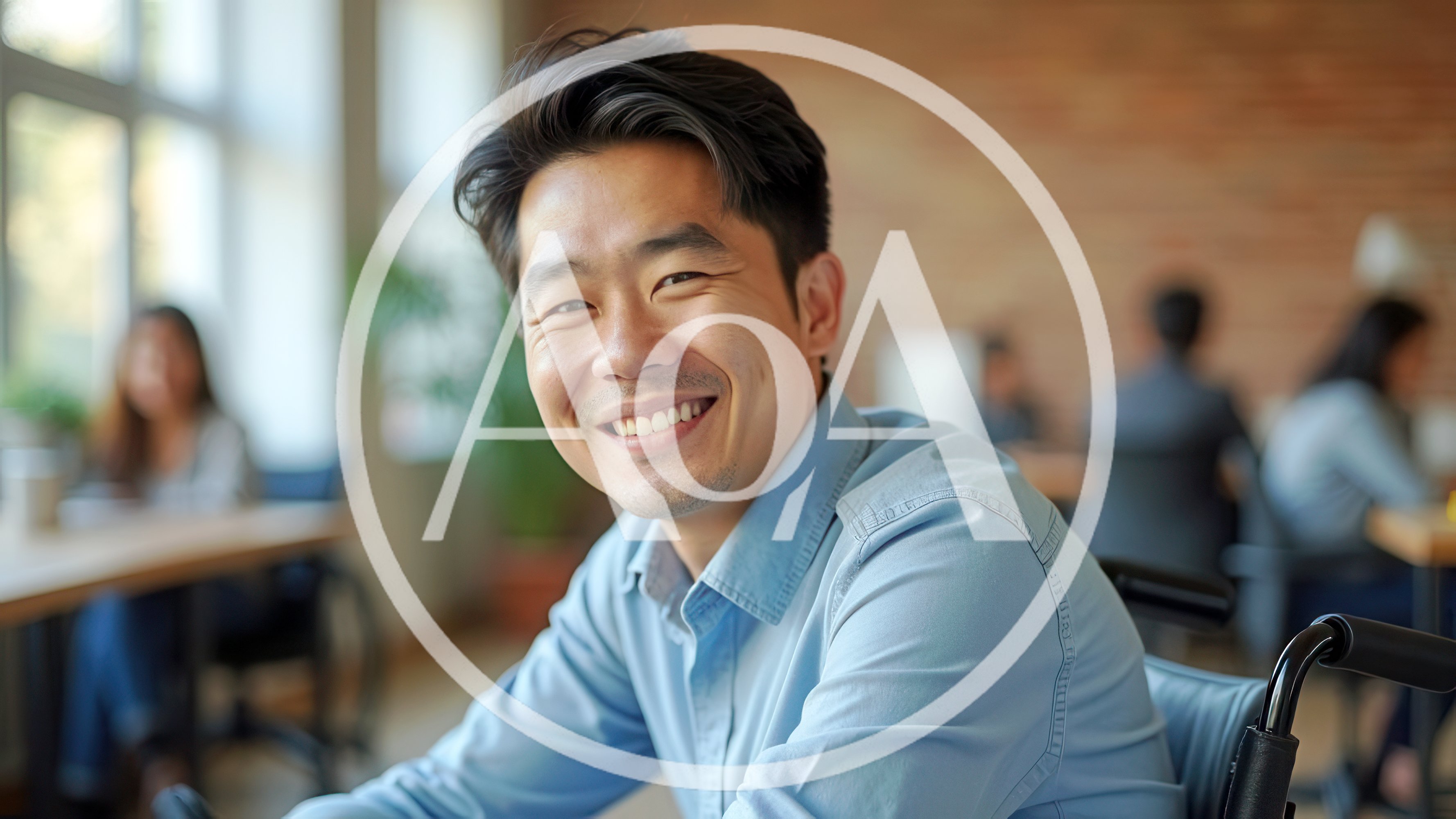Smiling Asian Man In Wheelchair Working In Office