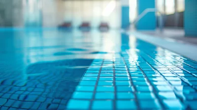 Close Up Of Blue Tiled Swimming Pool Edge
