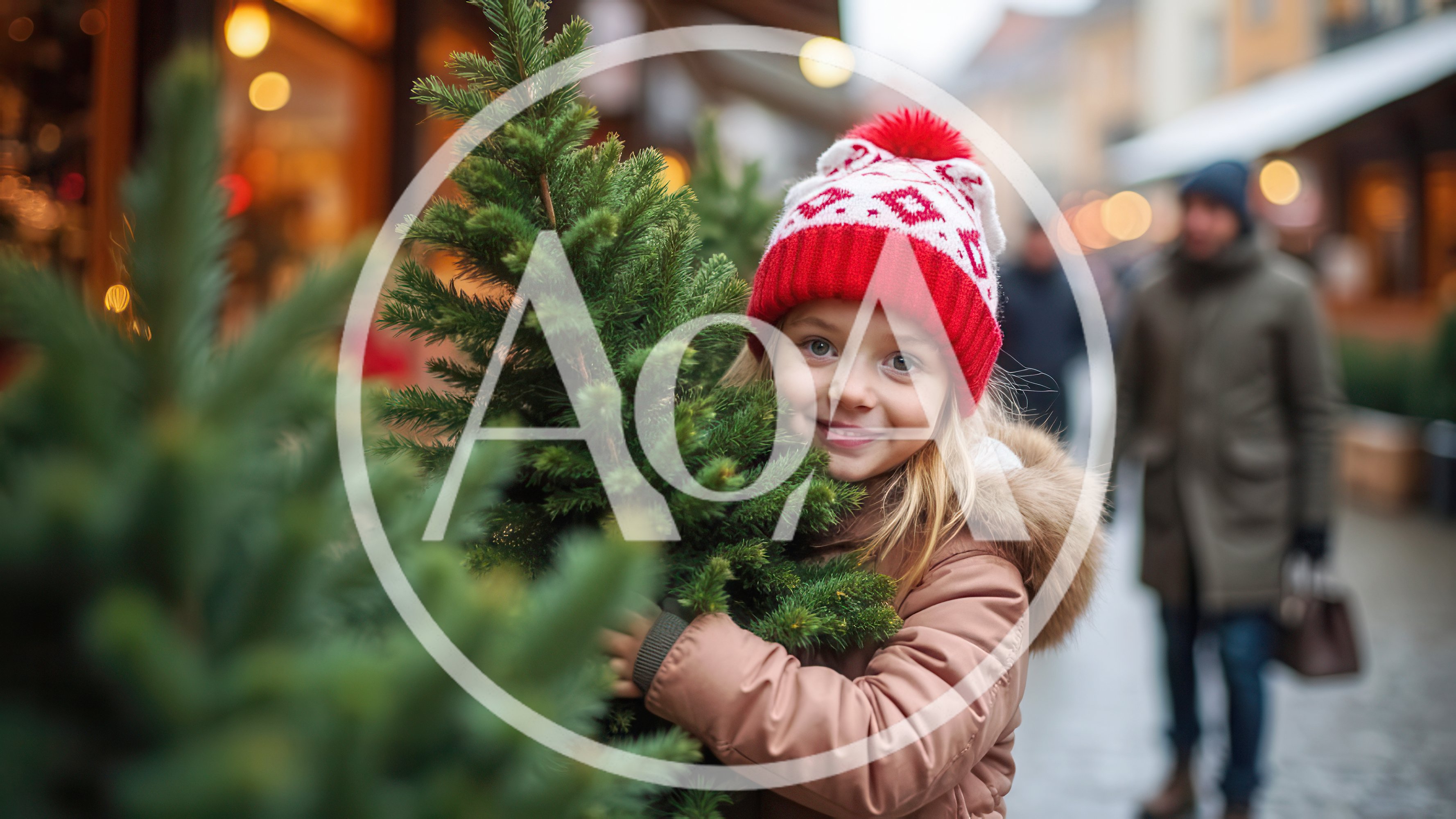 Young Girl Holding A Small Christmas Tree