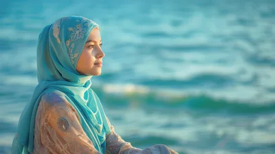 Young Woman Wearing A Hijab By The Sea